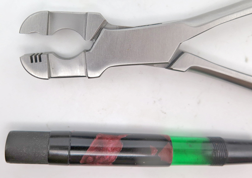 ITEM #PTS-8: PELIKAN PLIERS. THESE PLIERS WORK ON PELIKAN 100, 100N, IBIS & RAPPEN FOUNTAIN PENS. IT IS DESIGNED TO REMOVE THE SCREW IN NIB/FEED ASSEBLEY. THE TOOL HAS 3 SLOTS TO ACCPET THE RIBS ON THE BOTTOM OF THE FEED. 